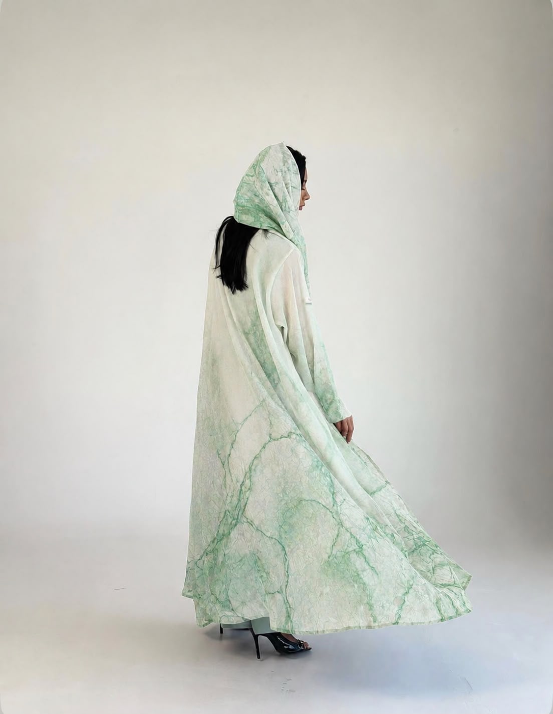 Mint Marble Abaya shown in motion