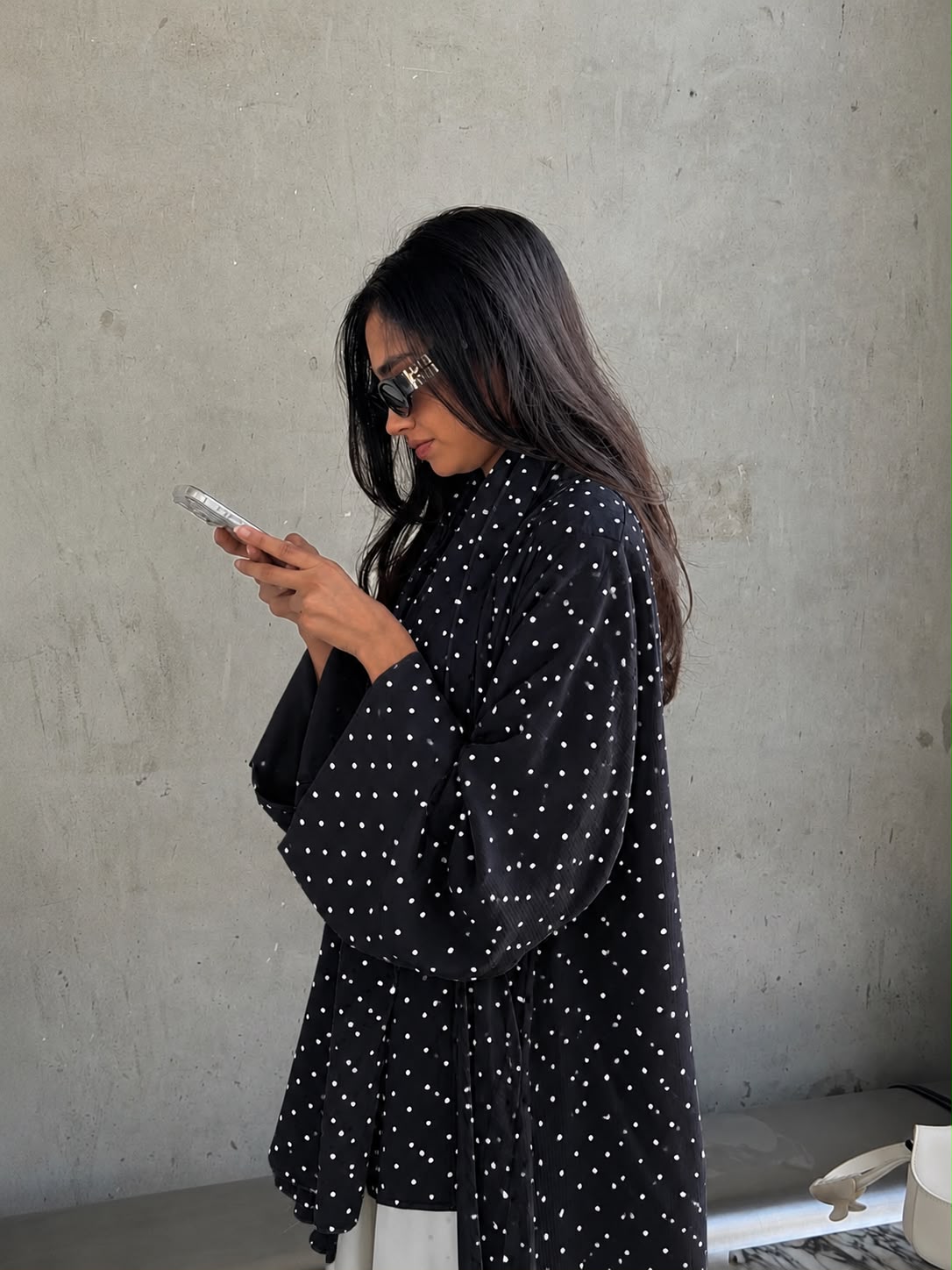 Black Monochrome Dot Abaya shown in profile
