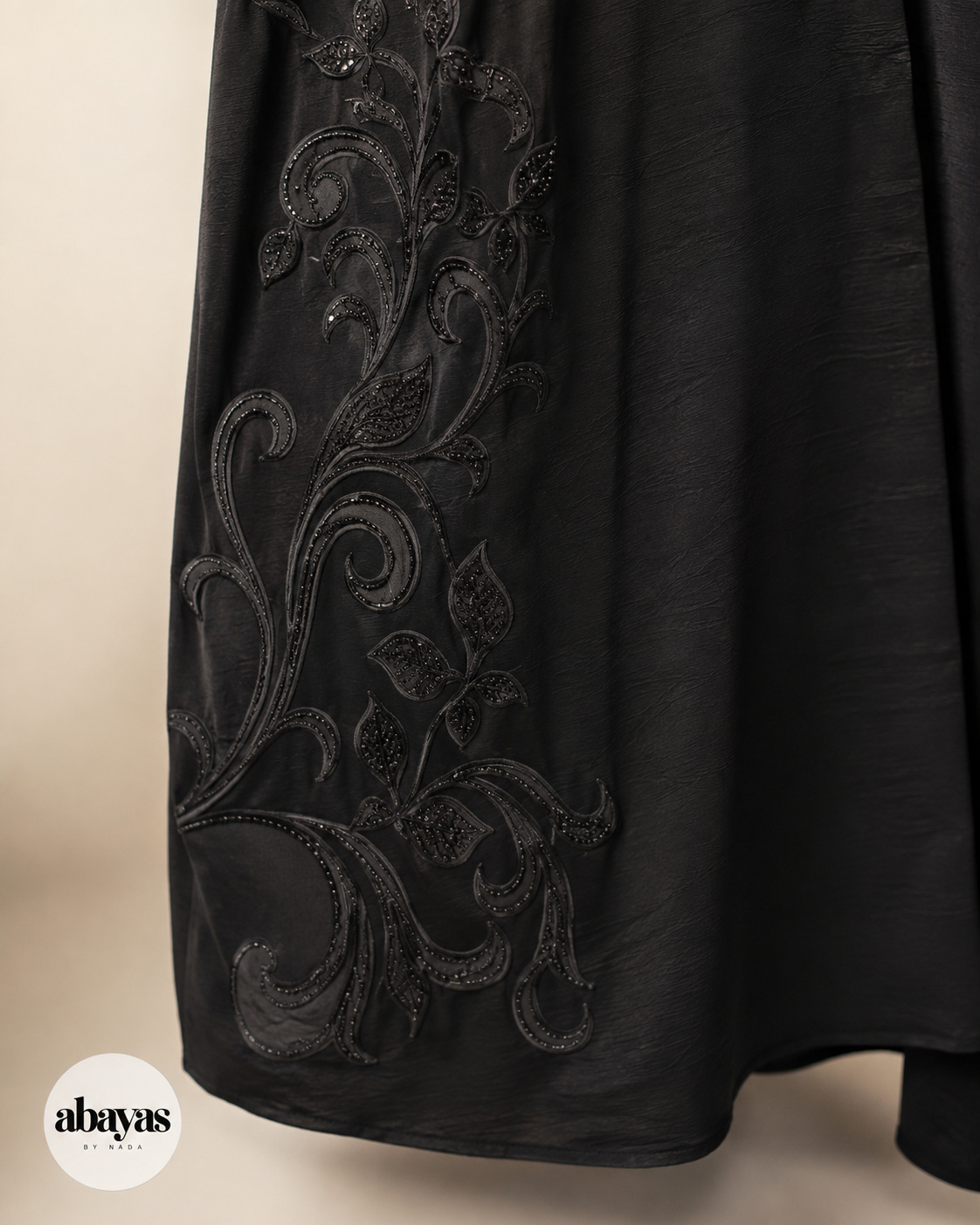 Close detail of the Ink Scroll Embroidered Abaya scroll and floral work