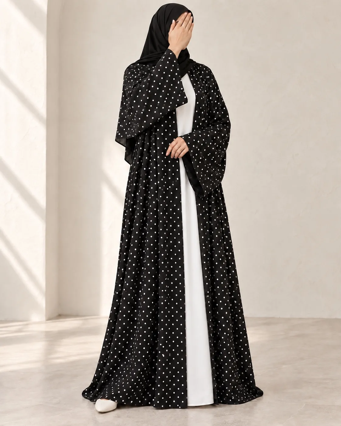 Black Dot Abaya shown without a model