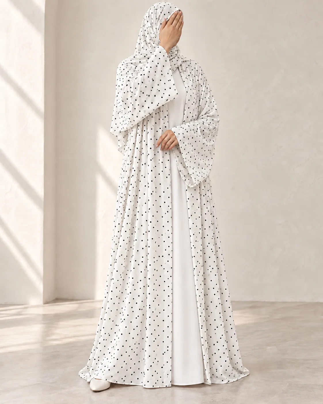 White Dot Abaya three-quarter view with small black dots