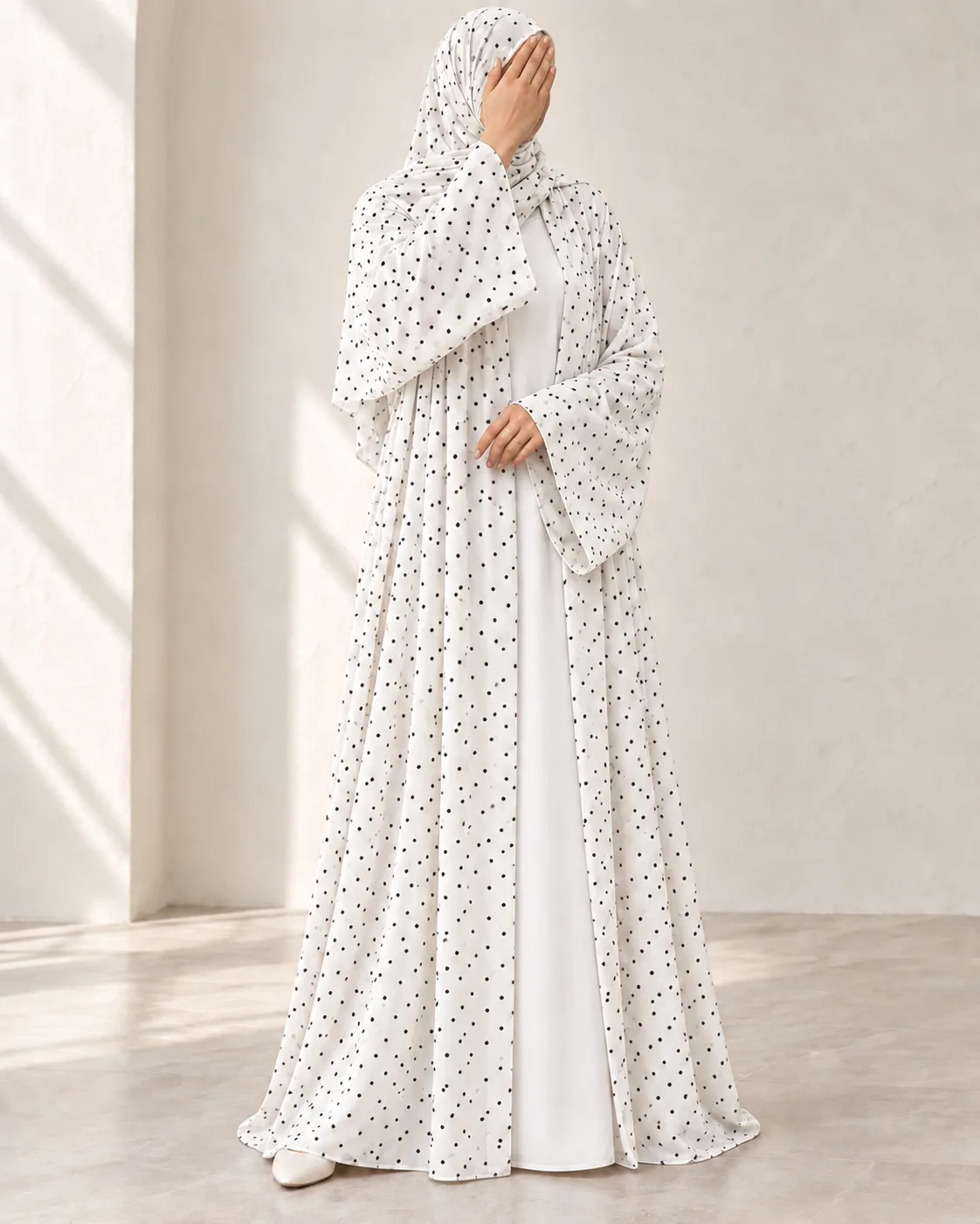 White Dot Abaya shown without a model
